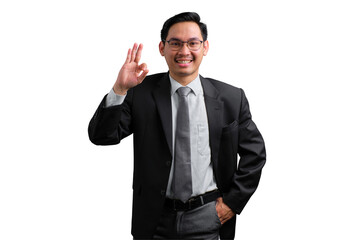 Confident young Asian businessman giving a thumbs up gesture, smiling and positive, isolated on...