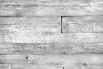 Close-up view of weathered gray wooden planks.