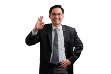 Confident young Asian businessman giving a thumbs up gesture, smiling and positive, isolated on transparent background