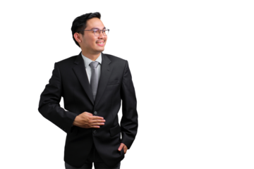 Confident young Asian businessman smiling and posing with hand on stomach, looking to the side, isolated on transparent background