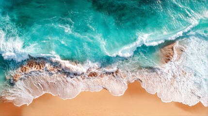 Obraz premium Turquoise waves meet sandy shore, an aerial view of nature's serene beauty and harmony.
