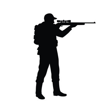 Silhouette of a hunter aiming a rifle with scope isolated on white