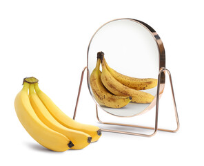 Bananas reflected in mirror as ones with dark spots, white background. Opposite, contrast,...