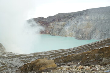 Volcanic lake eruption ijen crater nature photography cloudy environment elevated view scenic landscape