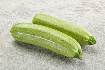 Raw green ripe zucchini vegetable