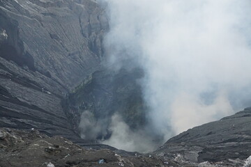Fototapeta premium Volcanic eruption activity mount merapi natural phenomenon smoky landscape aerial view earth’s power unleashed