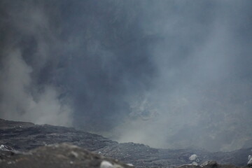 Volcanic eruption spectacle mountainous region nature photography ashy atmosphere close-up view geological activity