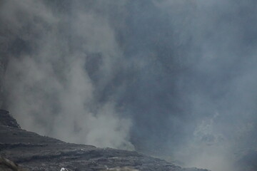 Volcanic eruption impacting landscape volcano region nature photography smoky environment aerial view natural disaster awareness
