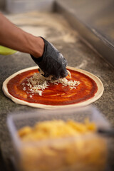 Adding Cheese to Pizza Base