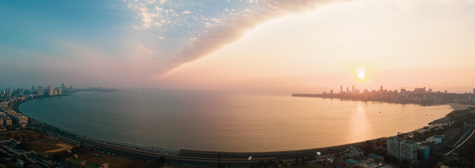 Most beautiful sunset with dramatic clouds at Marine Drive, Mumbai