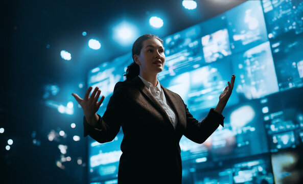 A woman is speaking on stage
