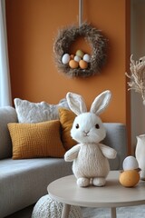 Soft, knitted bunny figurine on a living room table.