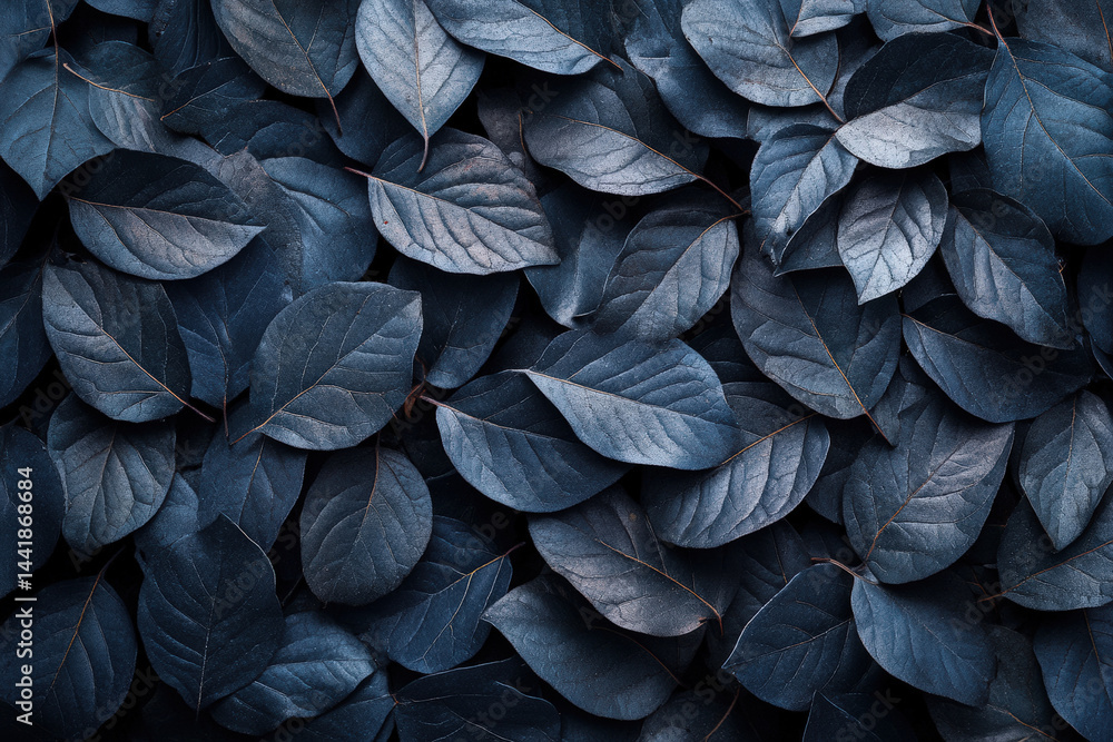 Poster deep blue leaves pattern. a close-up shot showcases a serene collection of deep blue leaves, arrange