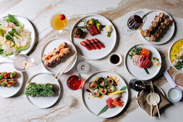 Colorful assortment of Japanese dishes on table