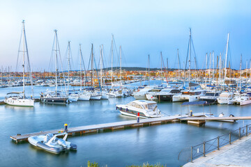Unbelivable evening view of Alghero port . Mediterranean seascape.