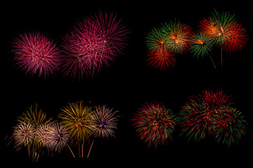 Set of colorful fireworks on the black sky.
