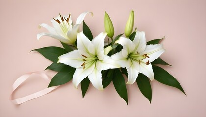 Fototapeta premium A beautiful display of fresh white lilies, leaves, and a delicate ribbon on pink.