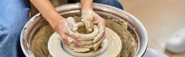 Crafting unique pottery creations in a vibrant and well lit studio space