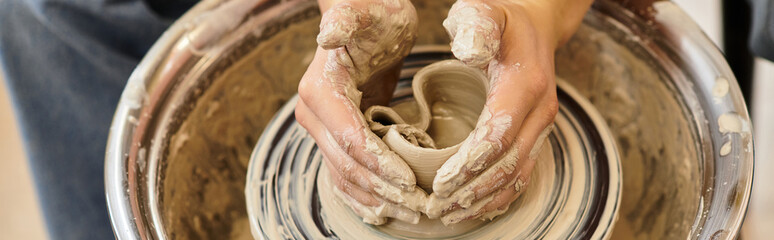 Creating unique pottery pieces in a vibrant studio filled with artistic energy and inspiration