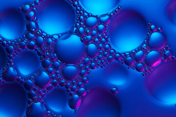 Macro of tiny transparent bubbles crowding the spaces between larger bubbles. The molecular surface...