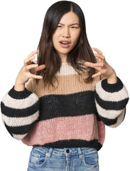 Young Chinese woman screaming with rage.
