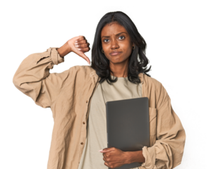 Young Indian woman studying with laptop feels proud and self confident, example to follow.