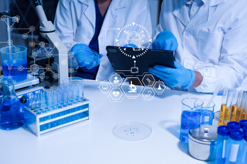 Lab work, Doctor holds a test tube takes the test from a test tube in analysis.