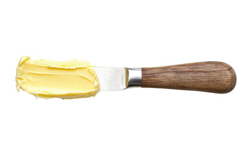 Creamy butter spread on a wooden handled knife perfect for baking or bread white background