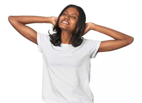 Portrait of a young Indian woman stretching arms, relaxed position.