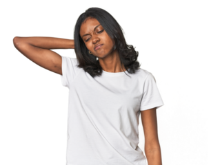 Portrait of a young Indian woman suffering neck pain due to sedentary lifestyle.