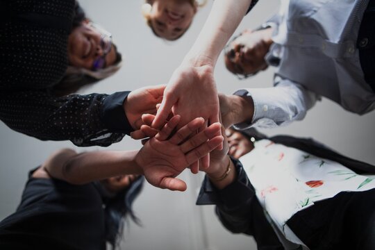 Diverse group of women hands in stack for teamwork. Women hands in stack for teamwork. Group of businesswomen hands in stack for teamwork. Women team hands in stack for teamwork