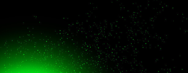 Panoramic blurred green fire embers sparks on black background . Texture isolated overlays. Concept of particles, sparkles, flame and light.