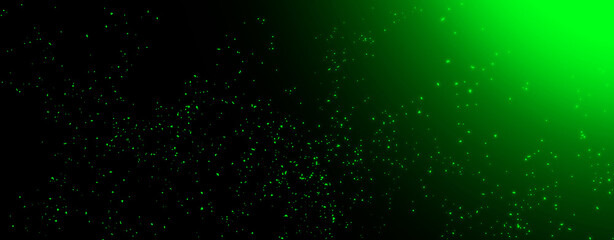 Obraz premium Panoramic blurred green fire embers sparks on black background . Texture isolated overlays. Concept of particles, sparkles, flame and light.