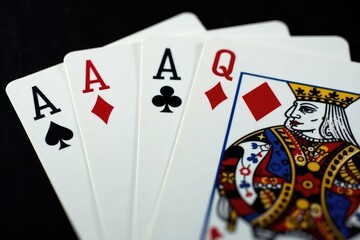 Obraz premium Four aces fanned out, showcasing intricate card details , gambling, design