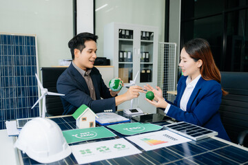 Business team people planning hand using laptop for working technology and business Net zero and carbon neutral concept.