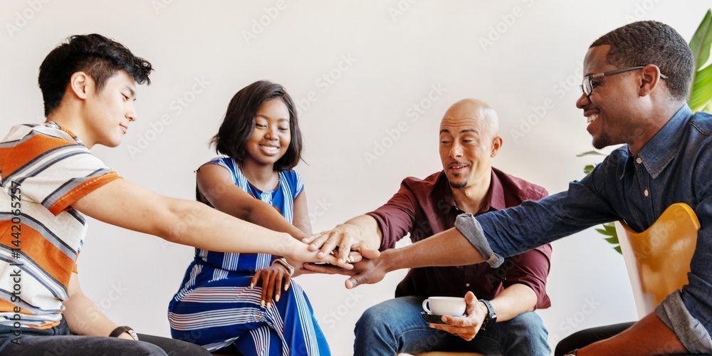 Poster diverse group of people collaborating, hands together in unity. teamwork and collaboration, diverse 