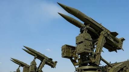 Surface to air missile systems against a clear blue sky background