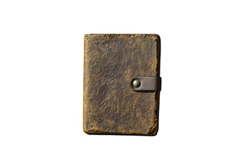 Aged leather journal rests on rugged rock sunlight illuminating its worn texture and sturdy clasp