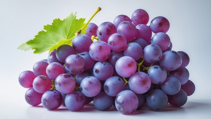 Fototapeta premium Ripe grapes set against a white backdrop