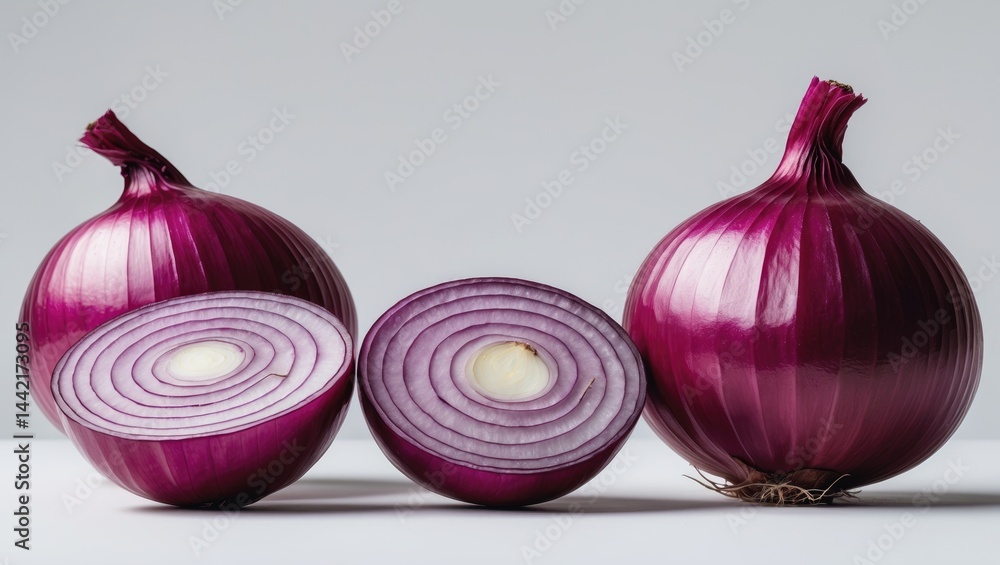 Poster Half and sliced onions isolated against a white background, with clipping path