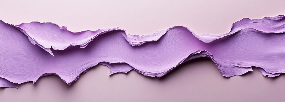 Soft pastel lavender paper featuring torn edges forms an abstract design, showcasing organic shapes and textures that invite creativity and visual interest