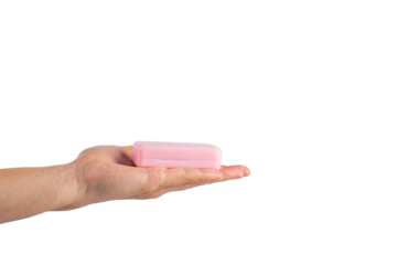 Pink soap in hand on transparent background
