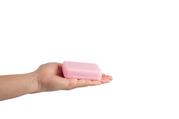 Pink soap in hand on transparent background