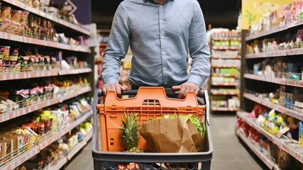 Searching for meal. Man is in the grocery store.