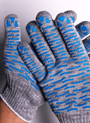 Industrial Protective Gloves with Blue Rubber Grip on White Background