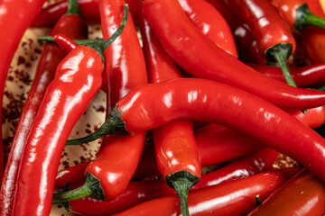 Close-up top view of red chili peppers.