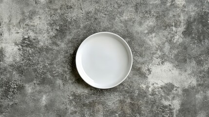 White Plate on Textured Gray Surface