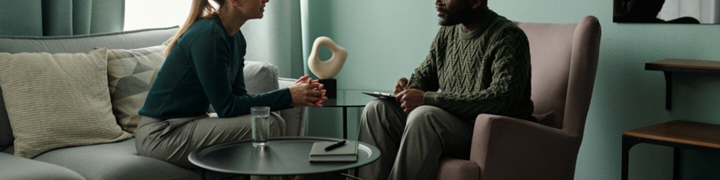 Young Woman Talking to Psychologist Header
