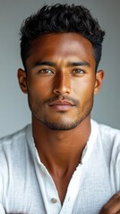 Fototapeta premium Portrait of a Handsome Man with Dark Hair and Brown Eyes