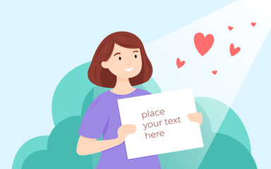Obraz premium A cheerful woman holding a sign with heart shapes in a serene outdoor setting